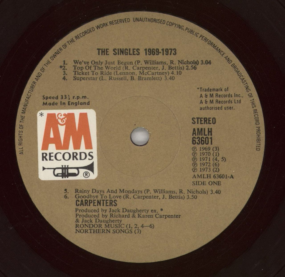 Carpenters The Singles 1969-1973 - Red Vinyl EX UK vinyl LP album (LP record) CRPLPTH863982